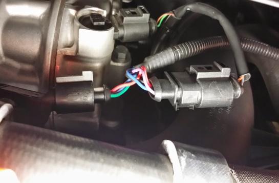 Disconnect lower intercooler hose at discharge pipe.